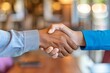 © wpw - People shaking hands with customers in a professional environment