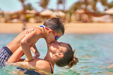 Fototapeta Na ścianę - Photo of relaxing vacation in Egypt Hurghada mother with son
