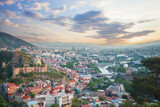 Fototapeta Niebo - Landscape of old Tbilisi on the background of spectacular blue sky with clouds