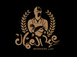Translation Workers Day in Arabic language Labour Day celebration greeting handwritten Arabic calligraphy font design gold colour on black Illustration of a silhouette of a construction worker 