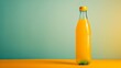 A Glass Bottle Of Orange Juice.