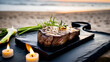 Gourmet steak on slate, succulent, fine dining, beachside barbecue