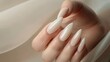 Portrait of beautiful nail art polished with sparkling varnish in natural colour