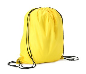 Wall Mural - One yellow drawstring bag isolated on white