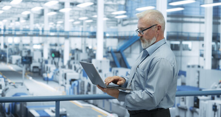 Aufkleber - Electronics Manufacturing Technician Working on a Laptop Computer at a Factory Space. Specialist Developing, Maintaining, Fine-Tuning Programs for Machine Production and Assembly