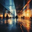 An intentionally blurred photo of people walking in a modern city
