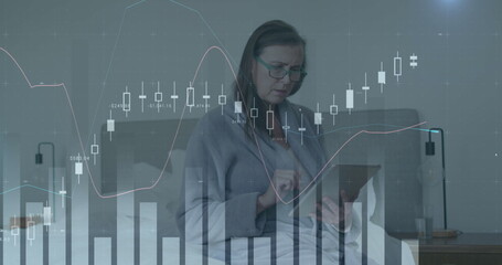 Wall Mural - Image of financial data processing over caucasian woman using tablet