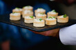 Hors d'oeuvres presented by server