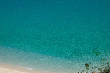 Fototapeta Kwiaty - Blue turquoise sea water background.