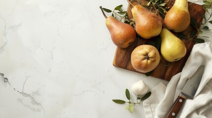 Wall Mural - A cutting board is topped with fresh pears next to a knife on a clean white kitchen countertop