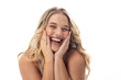 Plus size Caucasian woman laughs, holding face, on white background, copy space