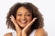 A biracial young female plus size model with curly brown hair on white background