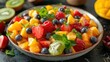 A bowl of fruit salad, a medley of colorful and juicy fruits, providing a refreshing and healthy treat.