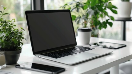 Poster - Laptop on white table with mouse and smartphone. Home interior or office background.