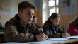 © ON - Studio - Focused Schoolchildren Taking an Exam in a Classroom
