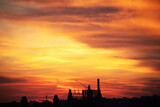 Fototapeta  - Background of a beautiful bright orange sunset with cirrus clouds