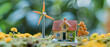 Miniature model house with wind turbine power generation, alternative electricity source, esg 