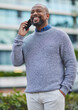 © peopleimages.com - City, business and black man with phone call on commute in morning with networking chat to client. Consulting, investor and conversation on street with smartphone to contact trader with opportunity