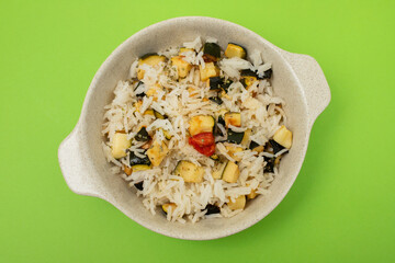 Canvas Print - Boiled rice with vegetables in small bowl