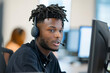 © AI_images - An Afro-American male customer service representative engages in conversation with his colleague while working diligently in the office