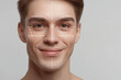 © alsu0112 - Male face with drawn lifting lines for a cosmetic procedure, demonstrating the process of contouring and tightening the skin. Cosmetology, procedures from cosmetologists.