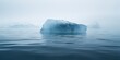 In the vastness of Antarctica, towering icebergs emerge from the frigid sea, showcasing the raw beauty of polar landscapes.