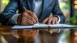 Businessman Demonstrating Business Acumen by Signing Contract Papers at Desk. Concept Business Acumen, Contract Signing, Businessman, Desk, Professionalism