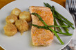 baked salmon served with scallops and asparagus