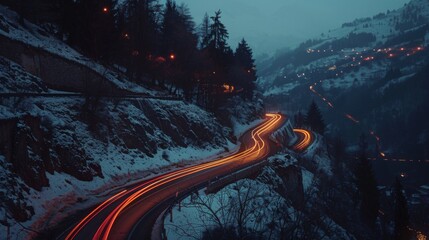 Poster - Trailing lights of cars winding along a mountain road during the dim hours of dusk