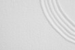Zen garden, Japanese garden with art line pattern on white sand background,Top Sand Nature texture surface with wave lines pattern,Background banner for Harmony,Meditation,Feng Shui,Zen like concept