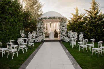 Wall Mural - Outside place decorated with white flowers for the wedding ceremony.