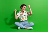 Fototapeta Panele - Full body picture of gorgeous young woman bob hair raised fists up celebrate she went vacation abroad isolated on green color background