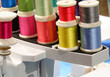 many threads of many colors for embroidery and sewing in the modern automatic sewing machine