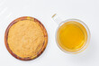 Drink of piloncillo and ground piloncillo, on white background