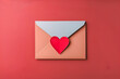 Craft paper envelope with red heart. Romantic love letter