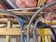 Basement utility room has network, electrical and solar system wiring and conduit