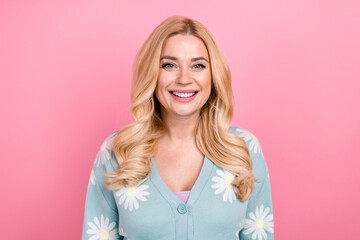 Canvas Print - Portrait of gorgeous good mood nice person with curly hairstyle wear blue cardigan toothy smiling isolated on pink color background