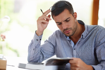 Aufkleber - Professional man, research and stress for project in startup company, burnout and anxiety for business. Notebook, reading and thinking of ideas in home for learning, career and confused.