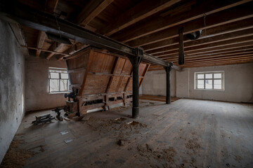 Wall Mural - Exploration of the historic old stone mill with a spiral staircase in Southern Poland, Europe, in Winter