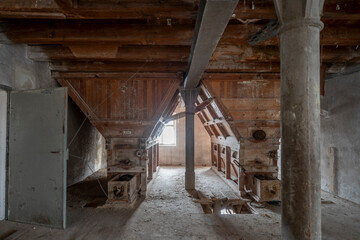 Wall Mural - Exploration of the historic old stone mill with a spiral staircase in Southern Poland, Europe, in Winter