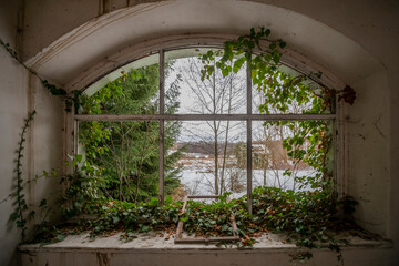 Wall Mural - Exploration of the historic old stone mill with a spiral staircase in Southern Poland, Europe, in Winter