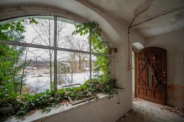 Wall Mural - Exploration of the historic old stone mill with a spiral staircase in Southern Poland, Europe, in Winter