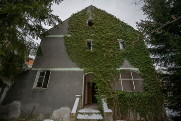 Wall Mural - Exploration of the historic old stone mill with a spiral staircase in Southern Poland, Europe, in Winter