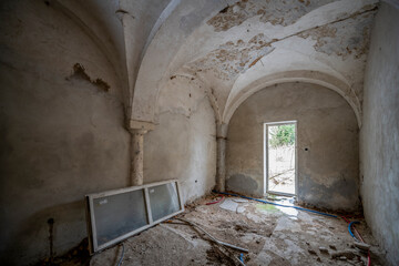 Wall Mural - Exploration of the historic old stone mill with a spiral staircase in Southern Poland, Europe, in Winter