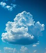 Large white cloud with a blue sky background