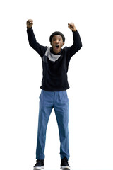 A man, full-length, on a white background, raised his hands up