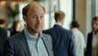 © Lull - Confident Businessman at Networking Event