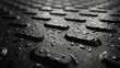 raindrops on metal surface with grate in foreground