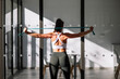 © ADDICTIVE STOCK - Home fitness routine with resistance band