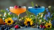   A few drinks, each with a rim adorned by flowers and berries, sit harmoniously atop the table